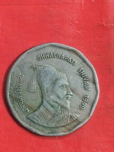 Seven old Indian Coins