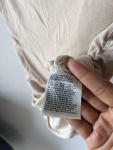 Beige gathered cap-sleeved top