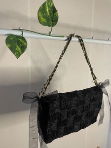 Chic Black Woven Clutch Bag with Chain Strap