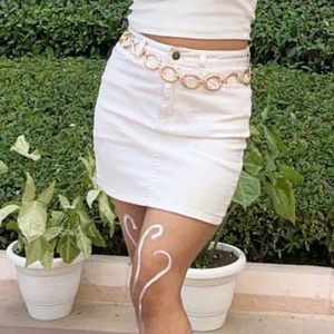 White Denim Mini Skirt – Casual & Chic minor spot