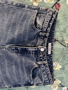 Distressed Wide Leg Denim Jeans