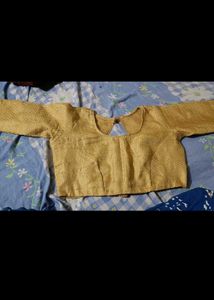 Woman golden stylish blouse