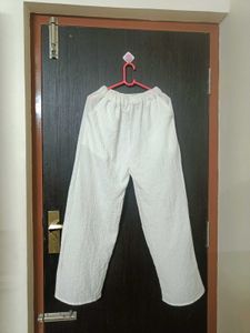 White textured wide-leg pants