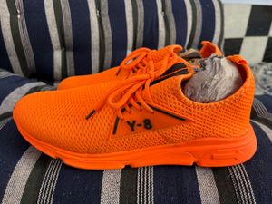 Orange sports shoes for mens