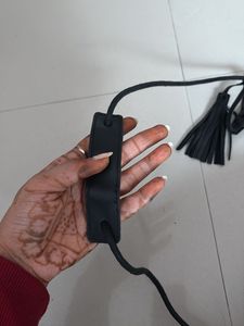 Chic Black Sling Bag with Tassel Detail