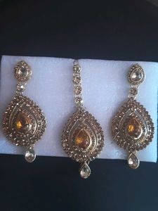 Ornate gold-tone stone earrings