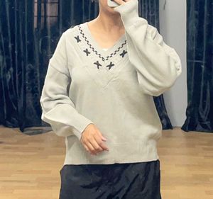 Oversized V-Neck Knit Sweater.