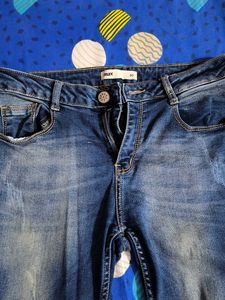 Distressed Denim Jeans