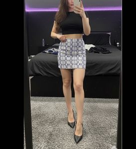 snakeskin print imported mini skirt