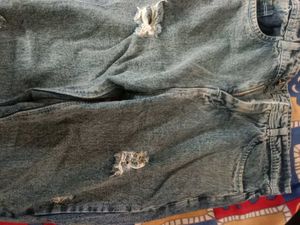 Ripped Blue Denim Jeans
