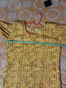 Beautiful yellow badhni print polyester kurti....N