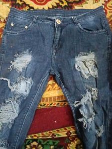 Ripped &amp; Distressed Denim Jeans