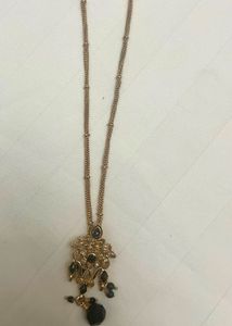 Elegant Gold and Black Necklace