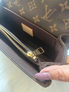 Authentic  Louis Vuitton  Metis East West