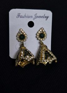 green emerald-toned earrings