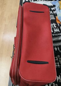 American Tourister Red DC Superlight Trolley Bag