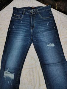 Distressed Denim Jeans