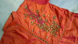 Elegant Orange Embroidered gown