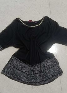 Kurti With Sequin And White Embroidery Like Detail
