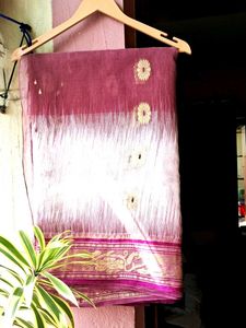 Elegant off white saree with maroon patch