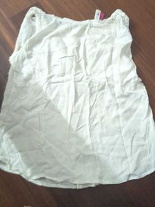 White Sleeveless Top