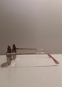 MINISO round rose‑tinted sunglasses