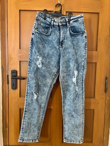 Distressed Blue Denim Jeans