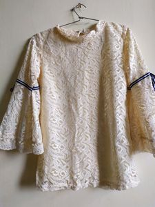 Top ,white cream in colour,