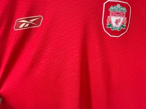 Show your Reds pride with the official Reebok
