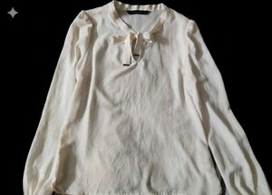 Elegant Cream Blouse with Tie Detail