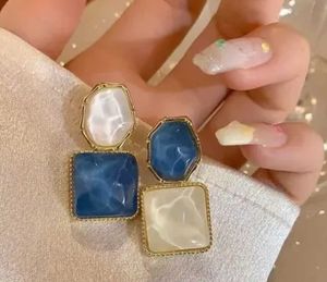 Stylish Blue & White Earrings