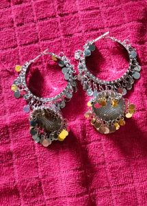 Heading:Elegant Silver Hoop Earrings