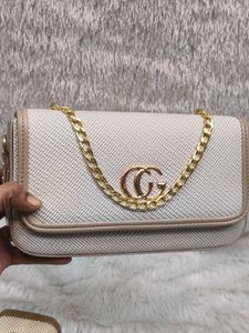 Chic Crossbody Bag with Chain Detail