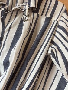 White Top With The Blue Strips On It