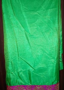 Parrot green saree with boat neck pink blouse