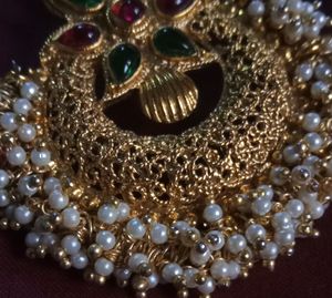 Rich Gold Jewellery Set Of One Detailed Worked Pendent With Two Royal Earings Completes Your Saree Look Perfectly