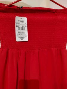 Chic Coral Strapless Dress with price tag