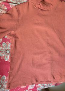 dark pink top with round neck