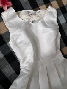 Pretty White Dress With Back Bow Design