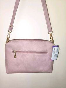 Pink Mochi Sling Bag With Quilted Front And Solid