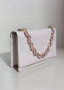 Blush croc embossed shoulder bag with pink chain