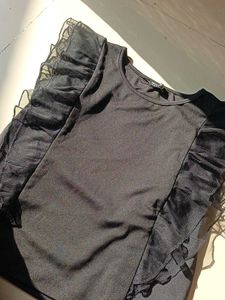 Elegant Black Top with Ruffle Sleeves