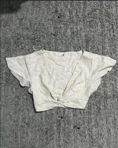 Minx and Moss linen cropped twist knot top
