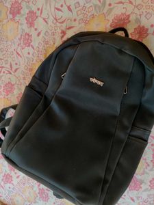 Black Backpack with Charm Detail