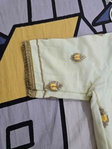 net lehanga with embroidery