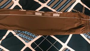 BROWN PUMA track pants