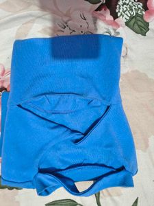 Blue  top used just twice busy 28/30 fitted