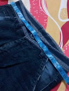 Stylish Jeans with Red Stripe