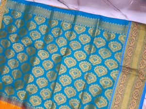 Orange and sky blue combination saree