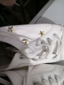 White Sneakers with Gold Star Detail